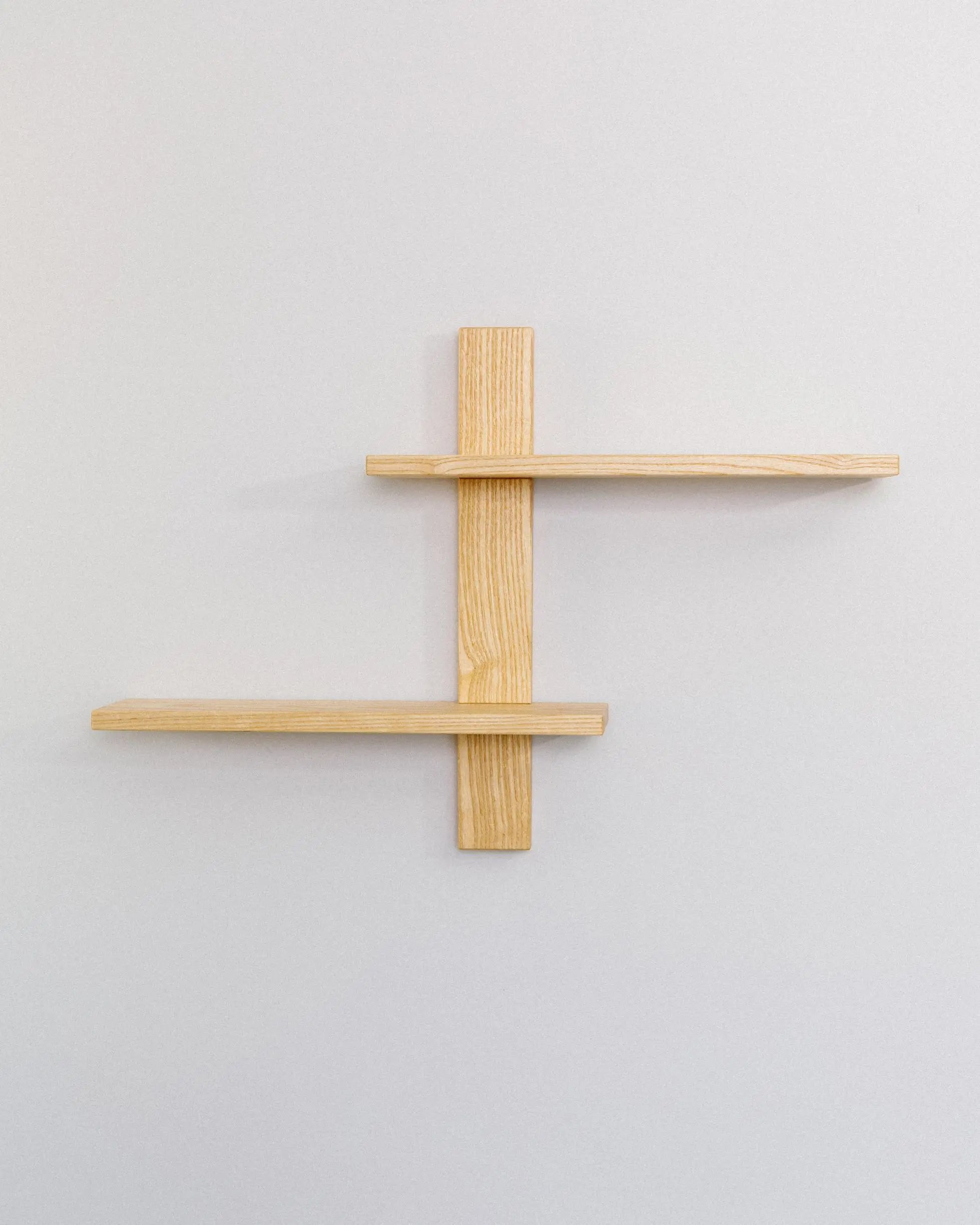 Solid wood wall shelf with asymmetric layout – durable and aesthetic for modern home environments