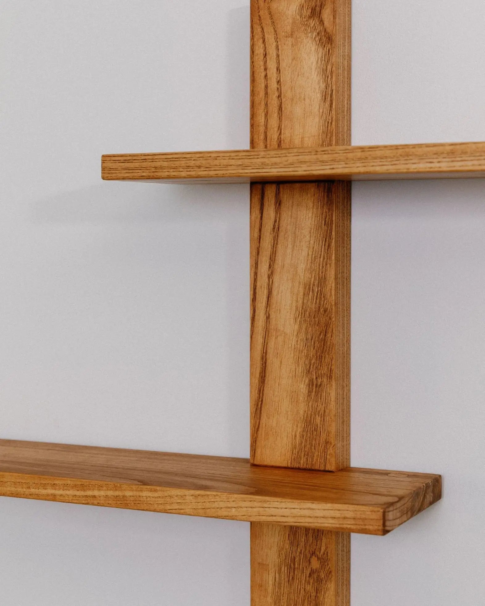 Functional yet artistic vertical shelf made from high-quality timber – great for displaying plants or accessories