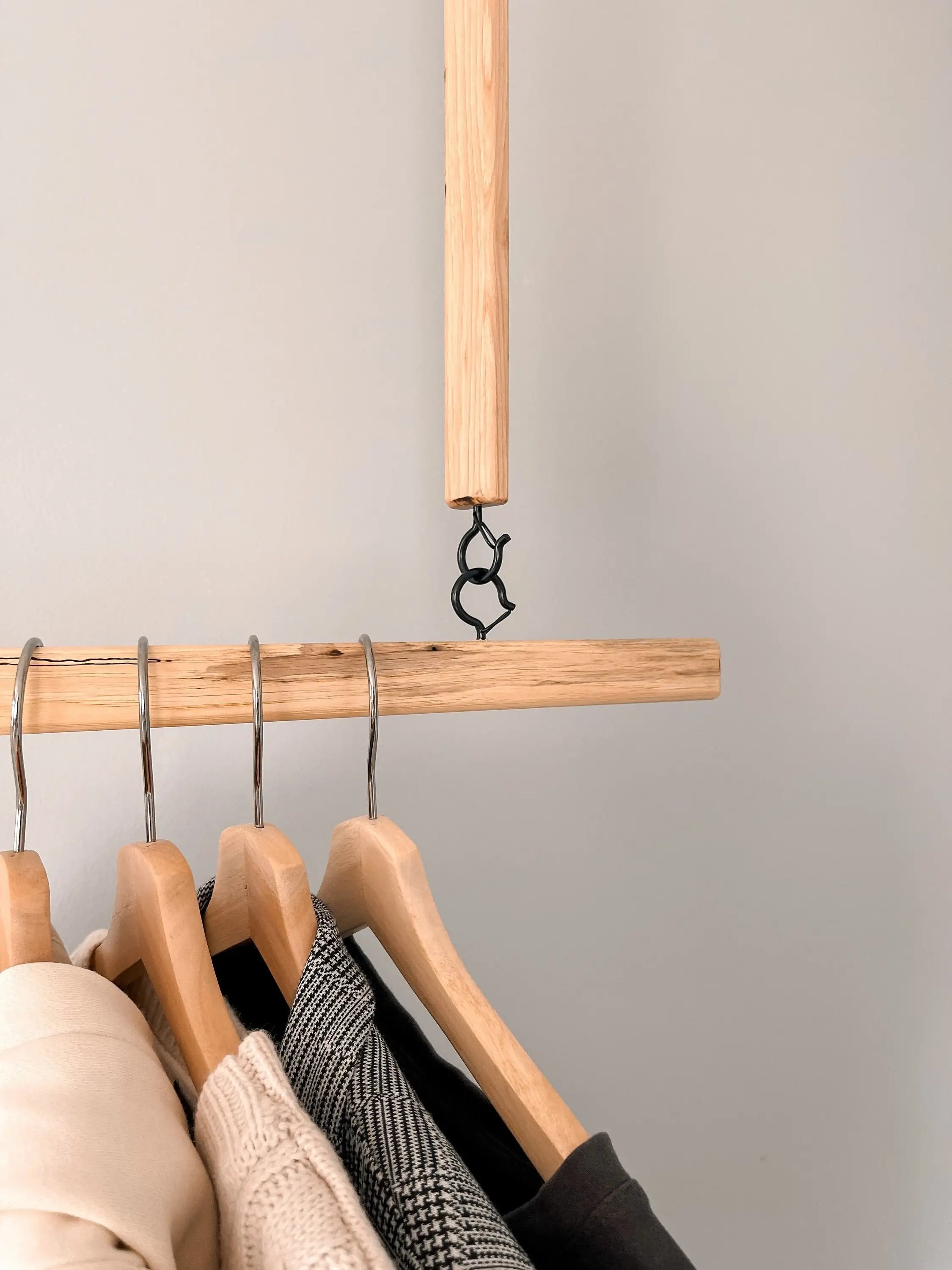 Minimalist ceiling-hung rack – made from real wood for versatile home use