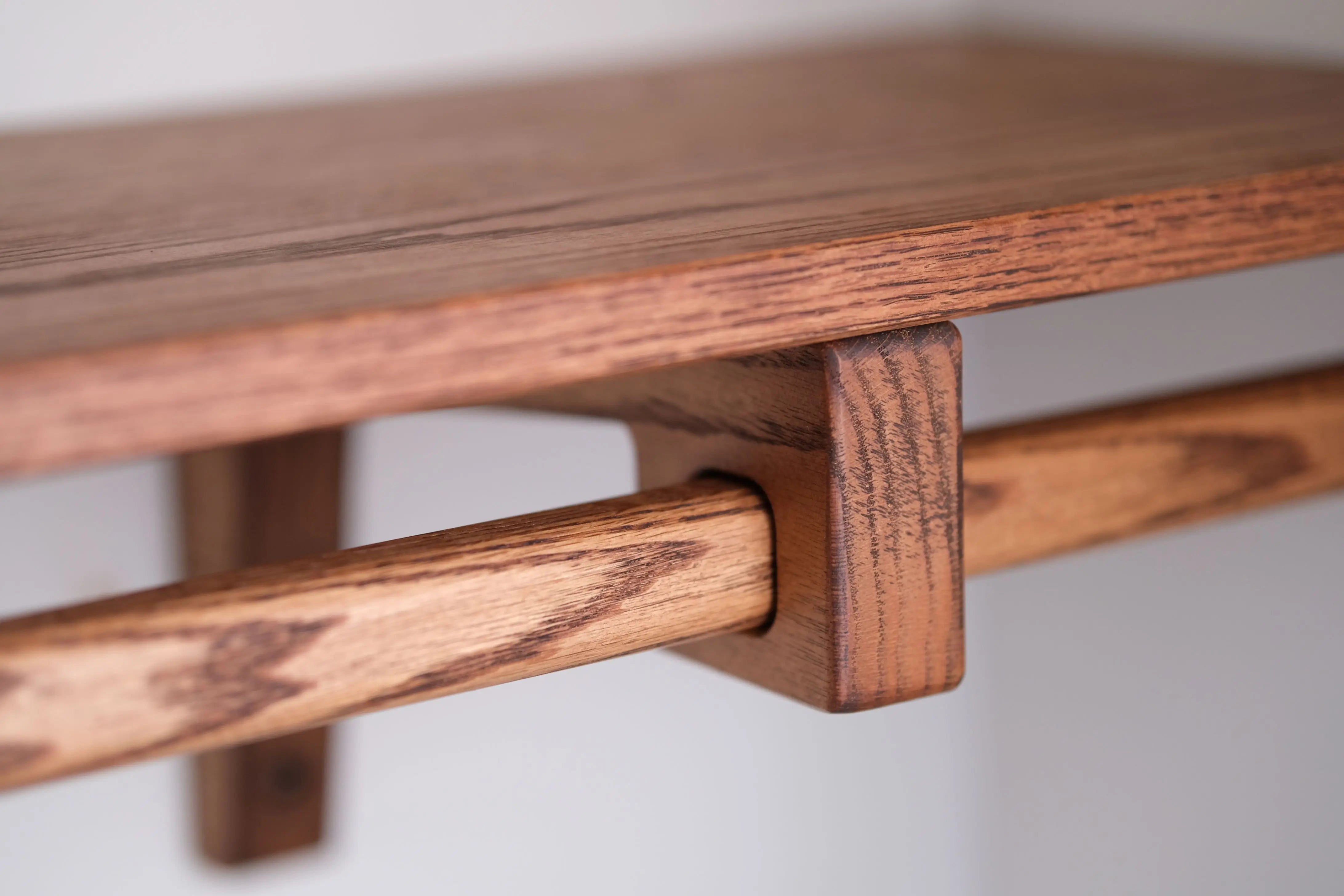 Handcrafted closet shelving system made from solid wood – natural finish with smooth edges