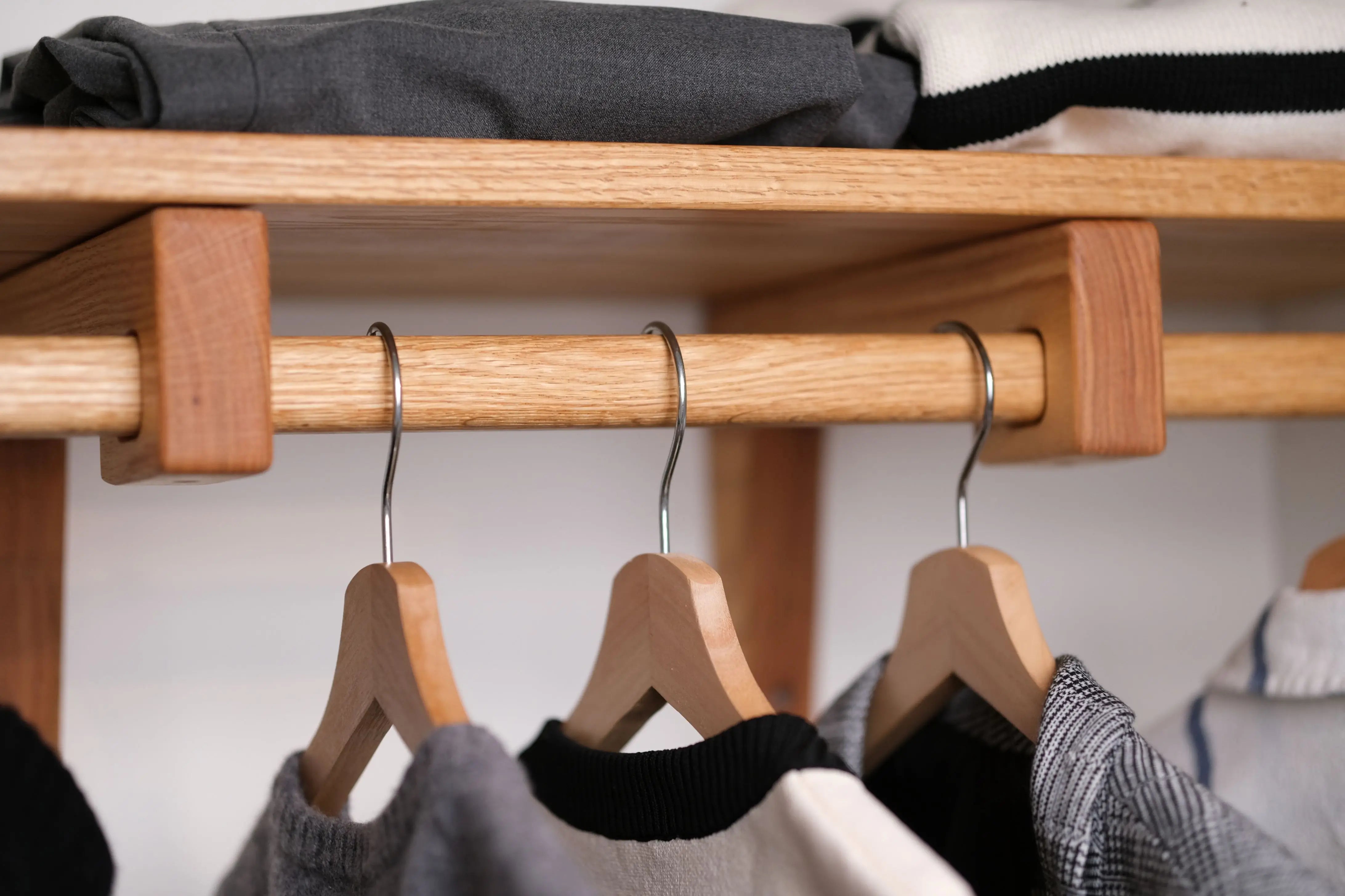 Natural wood closet organizer shelves – perfect for folded clothes and storage bins