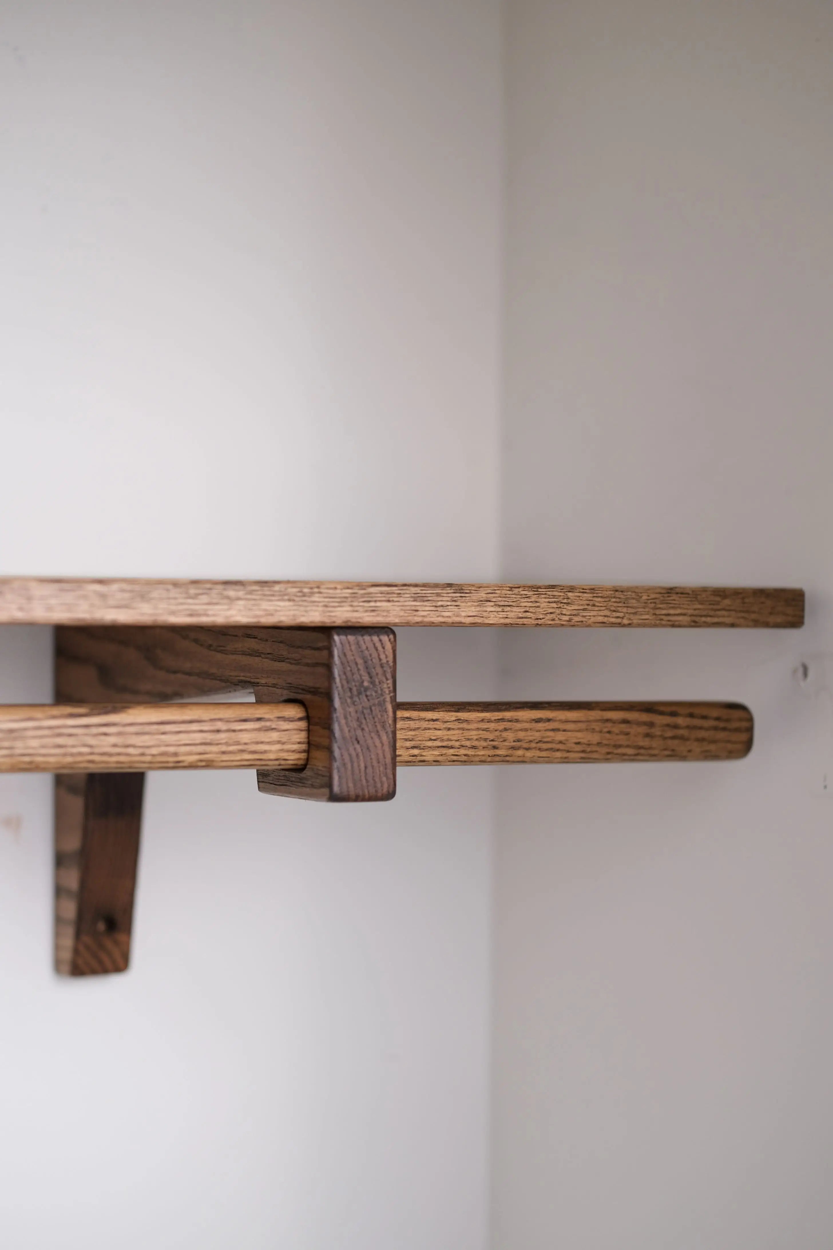 Durable dark oak wood closet shelf – handcrafted for upscale home organization