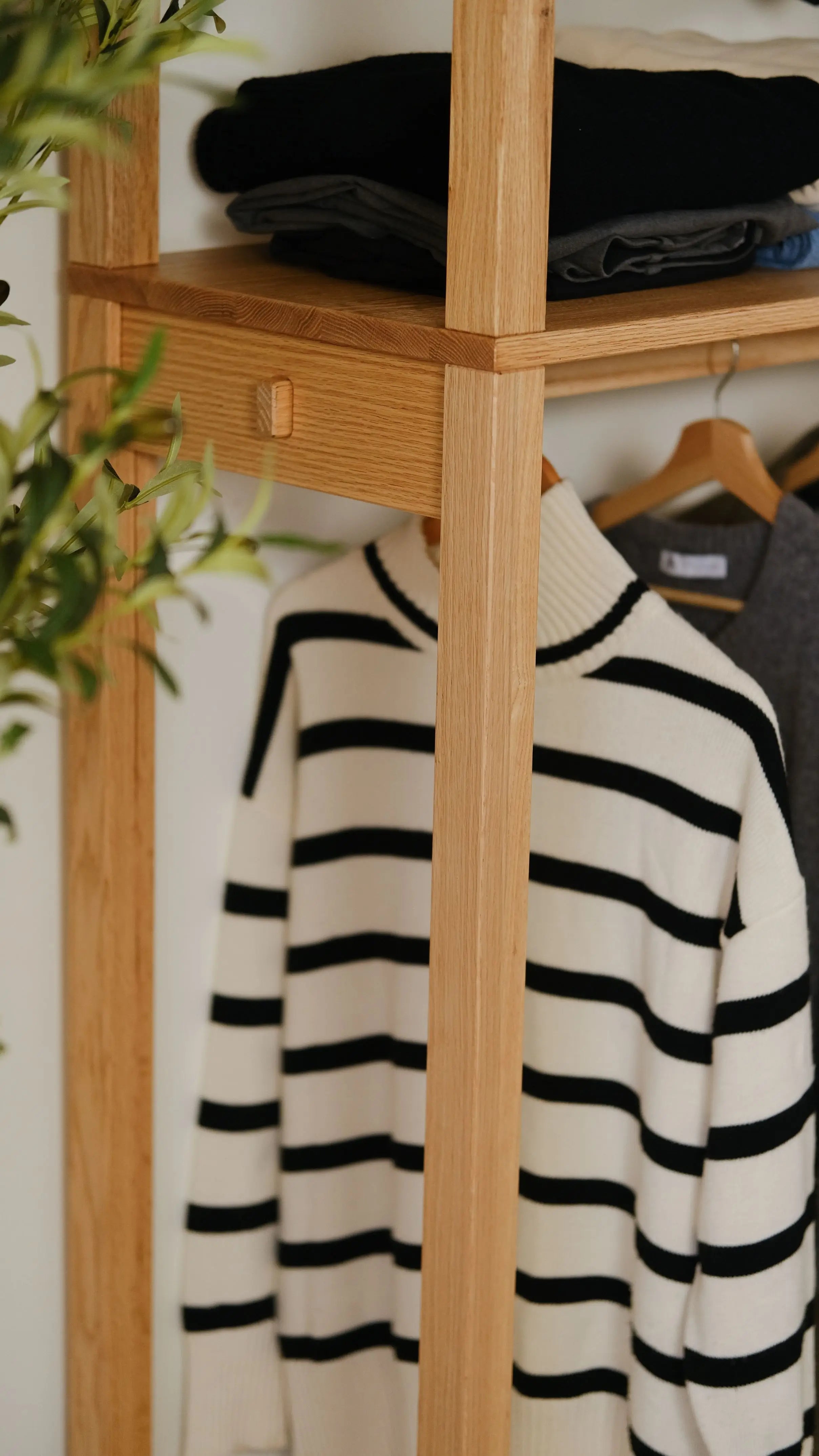 Minimalist oak garment rack – space-saving two-tier design with durable wood build