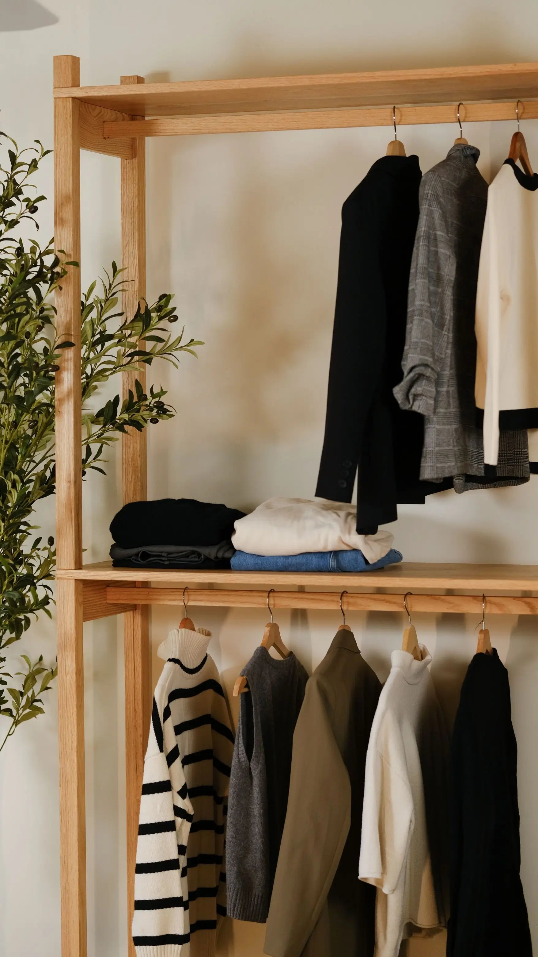 Minimalist two-tier oak wood clothing rack – handcrafted for modern wardrobe organization