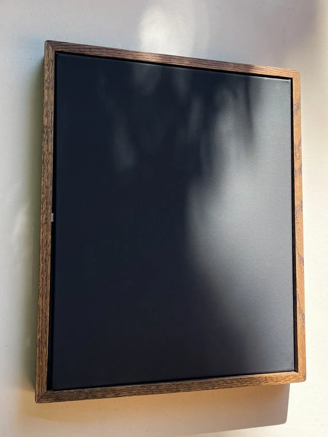 Wall-mounted canvas with premium oak wood floating frame