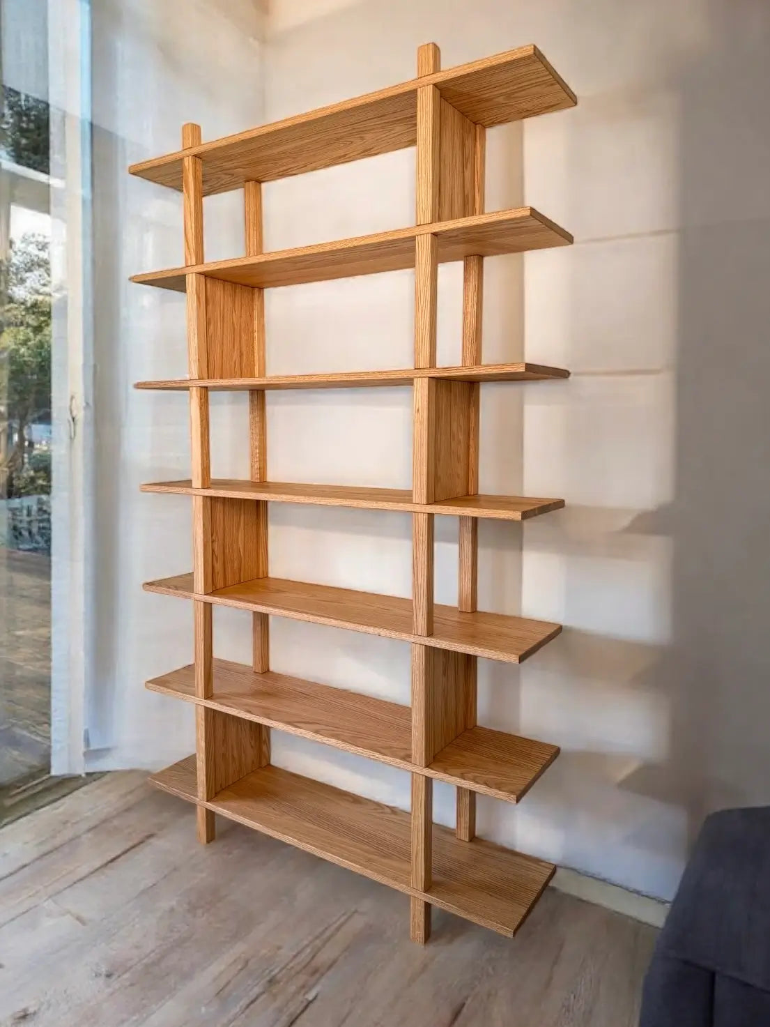 Solid wood struttura bookcase – minimalist and structured display for books and decor