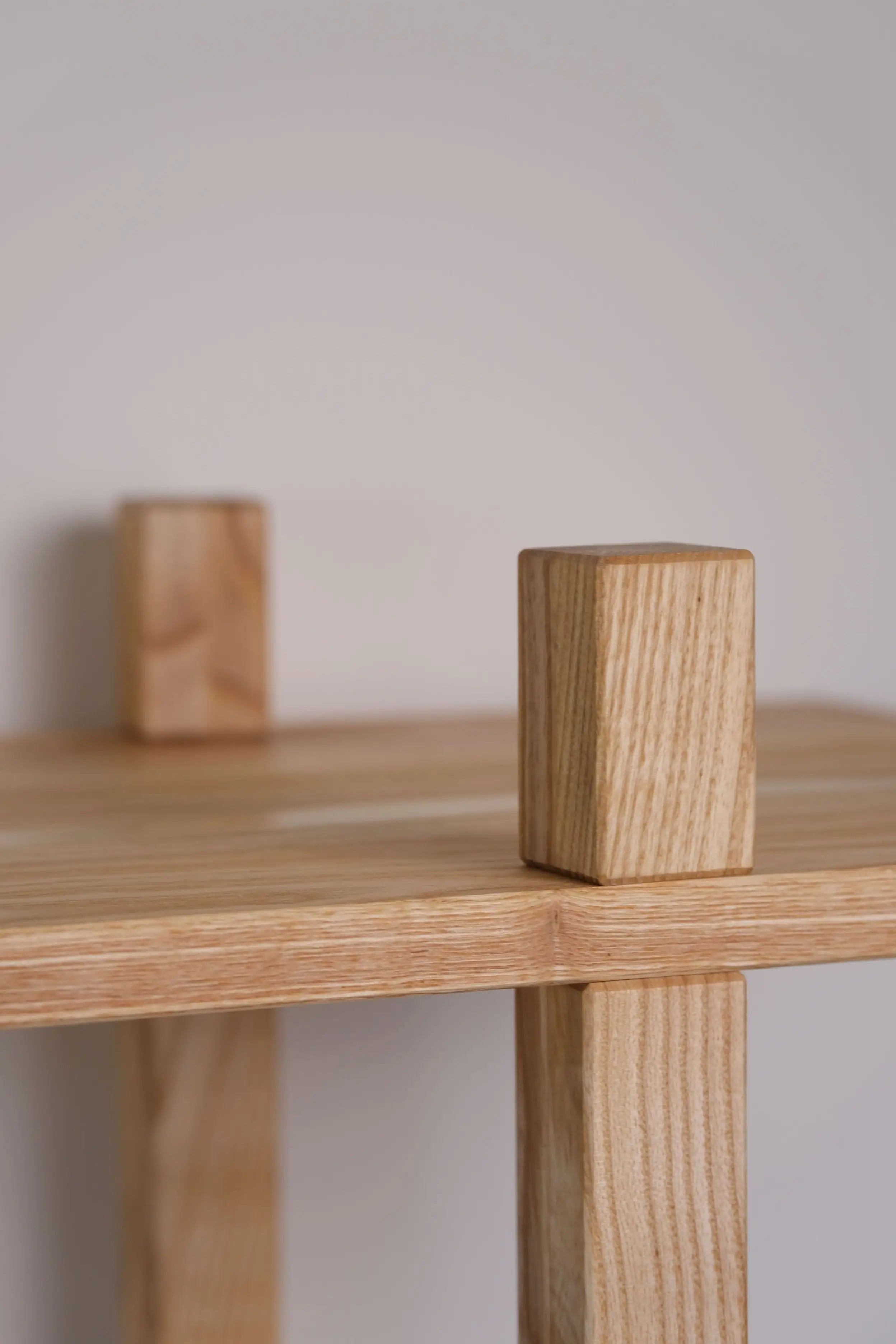 Scandinavian-inspired Sunli bookshelf – natural wood with smooth grain texture
