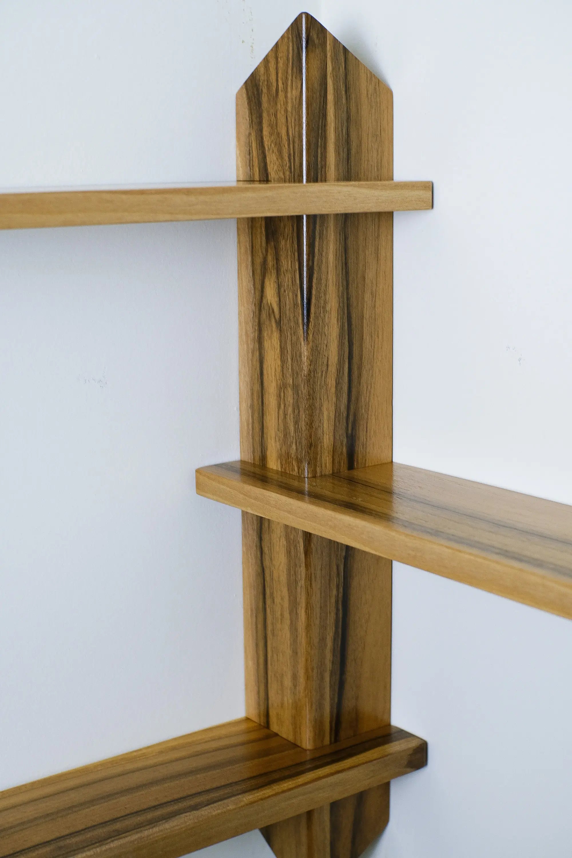 Modern wooden corner shelving unit – ideal for displaying plants, books, or decor