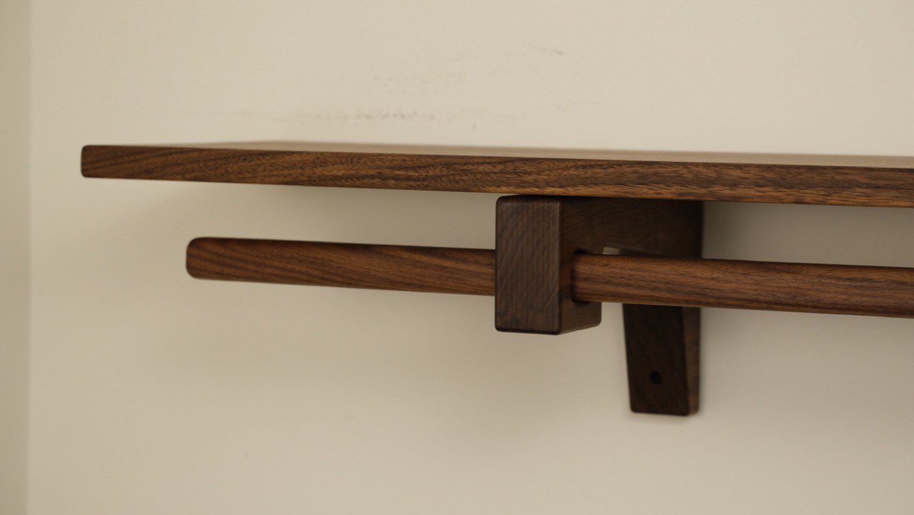 Custom walnut wood closet shelf – elegant and practical addition for clothing storage