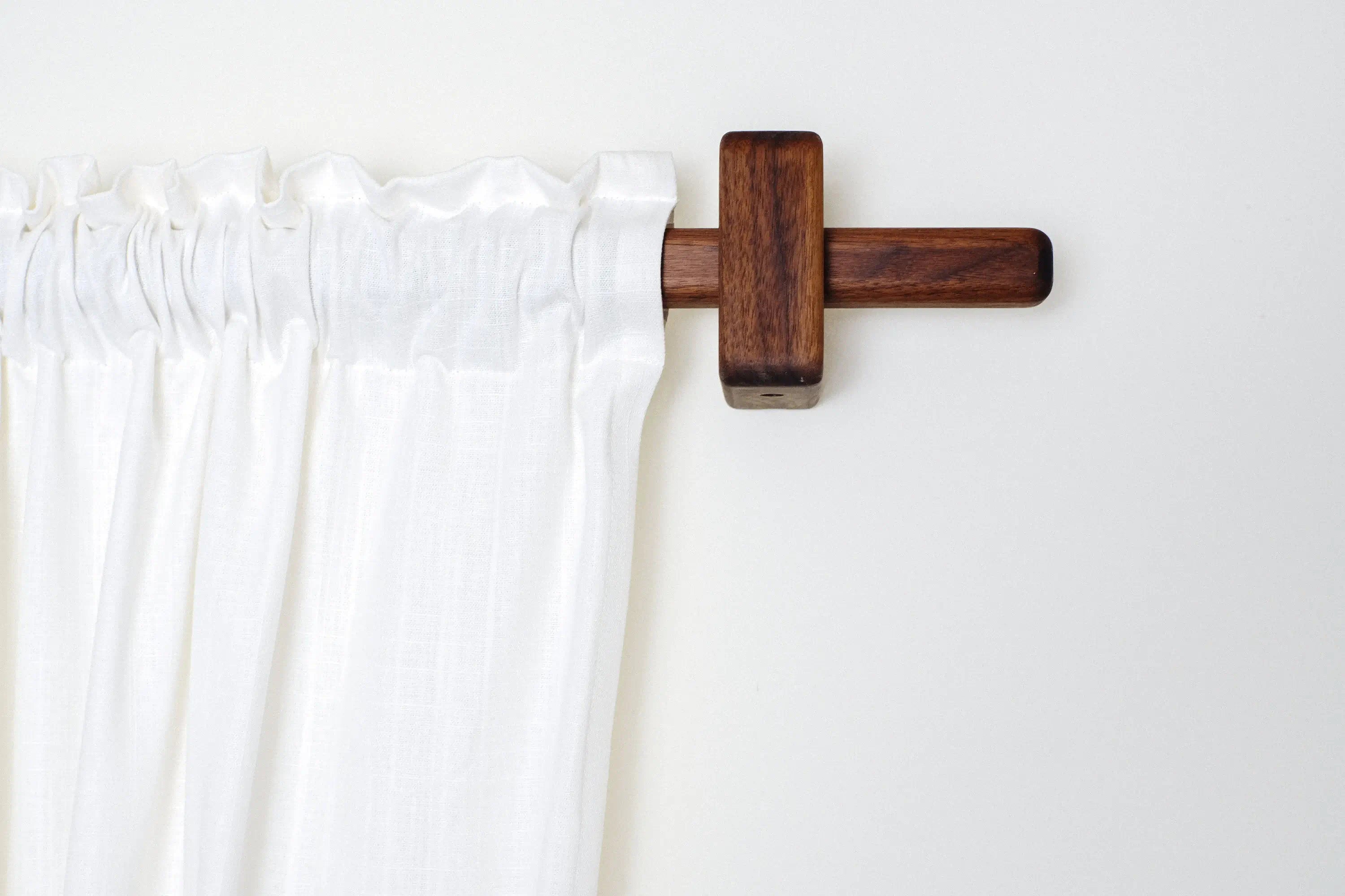 Natural wood brackets for curtain rods – minimalist and durable hardware
