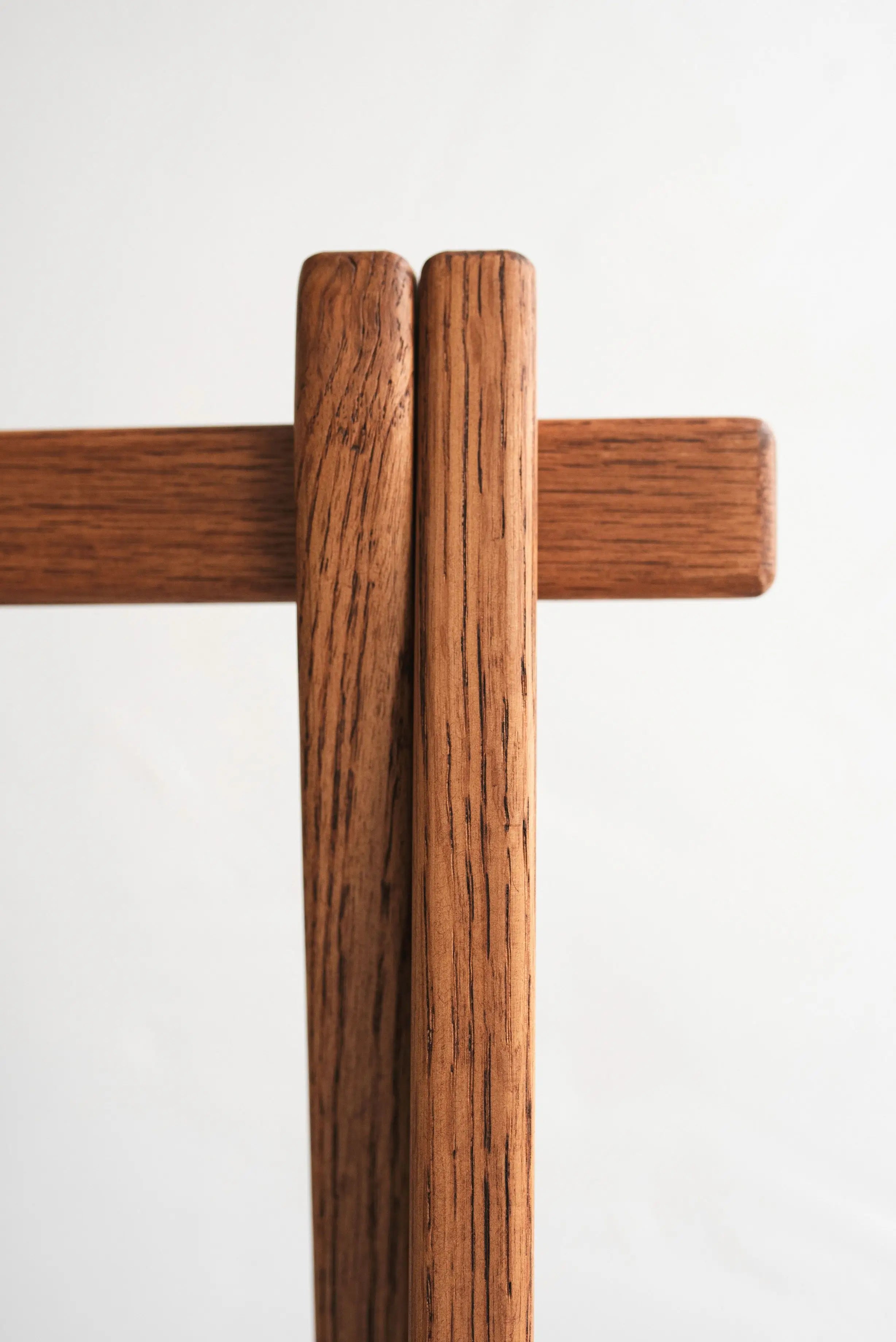 Pair of wooden chopsticks on a white background