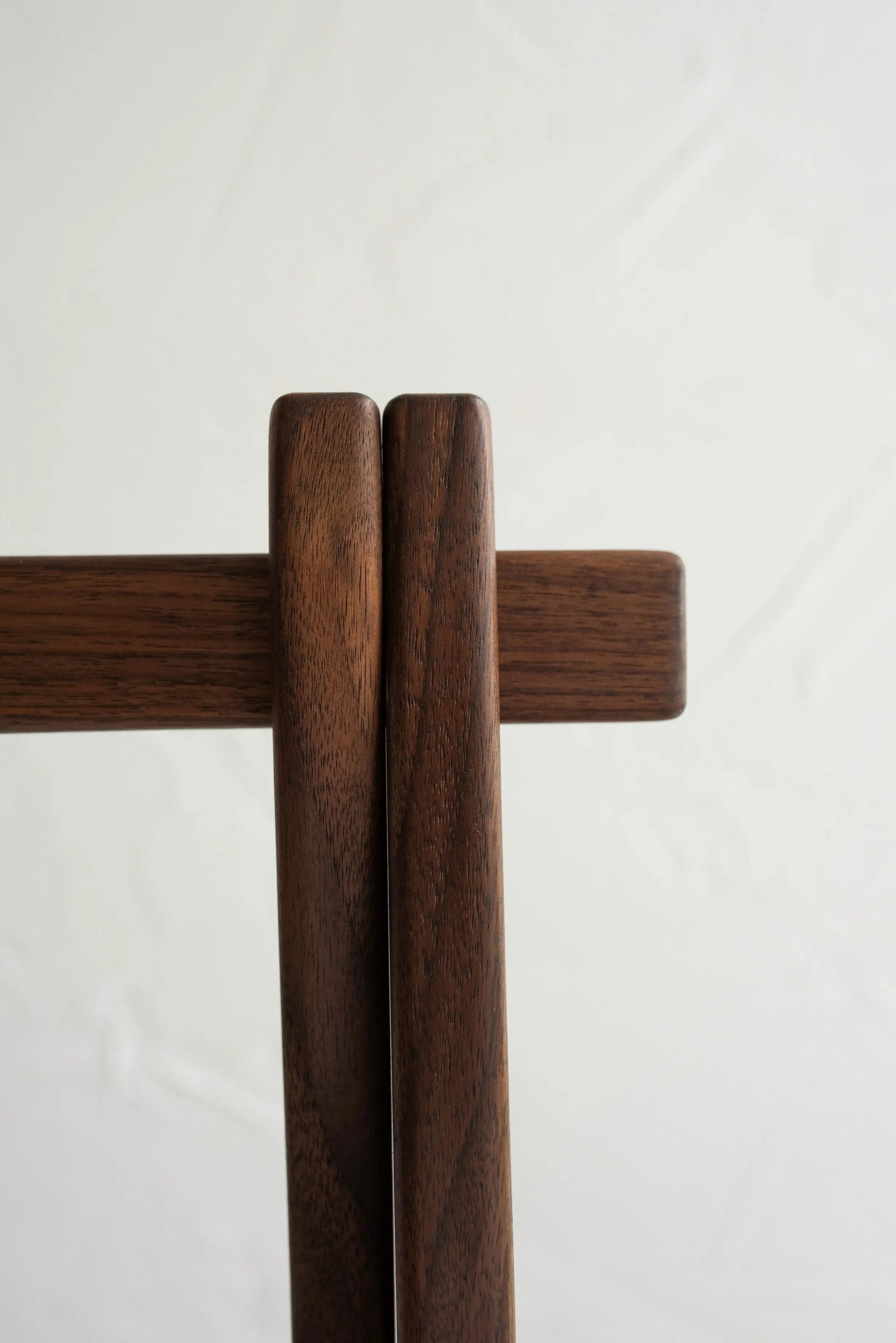 Wooden cross on a white background