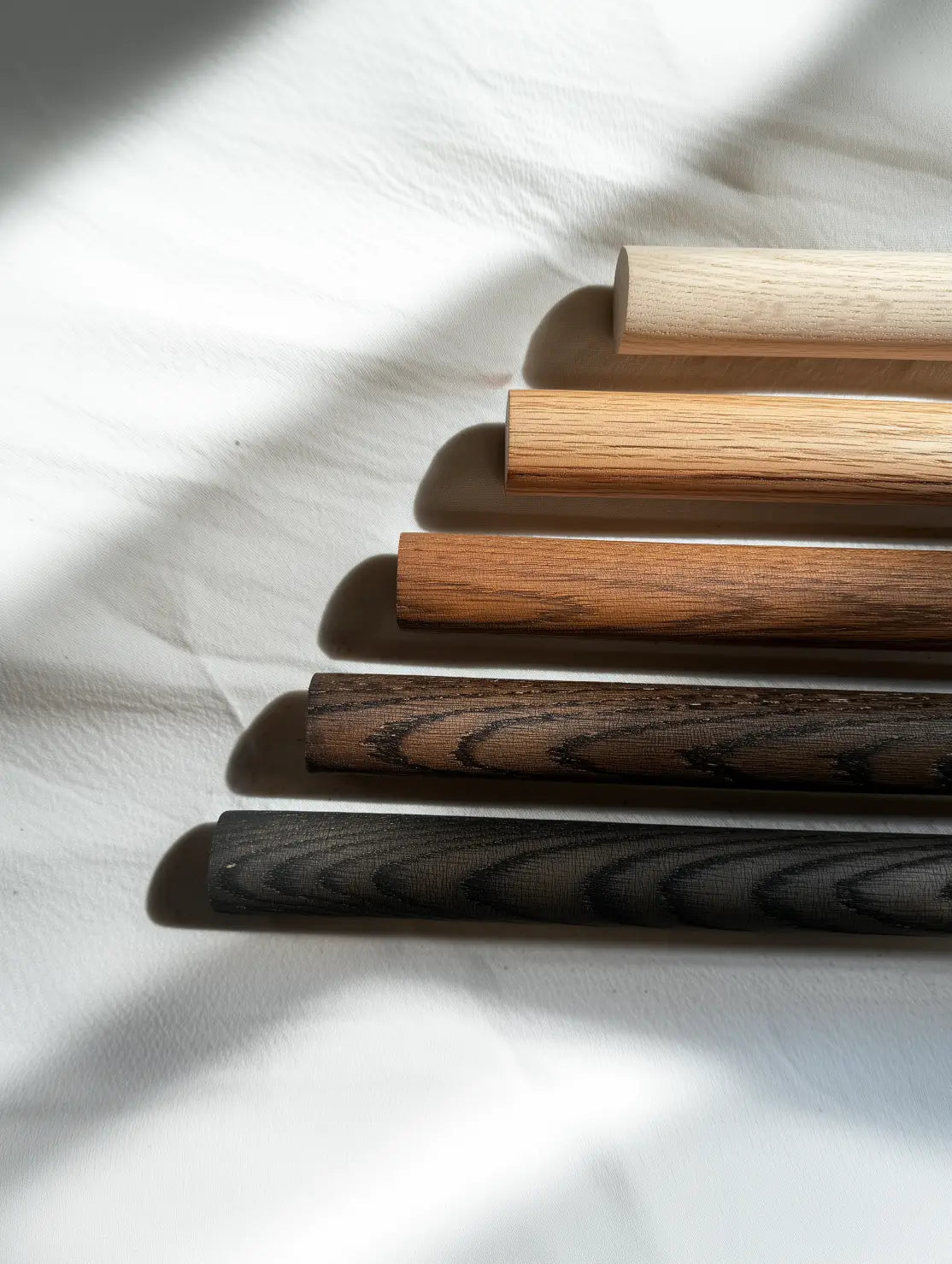 Wooden rod used for minimalist hanging storage
